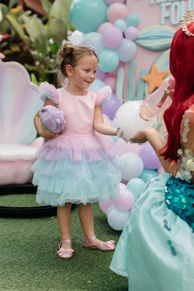 Little girl at a mermaid-themed party during the bubble show in Bali