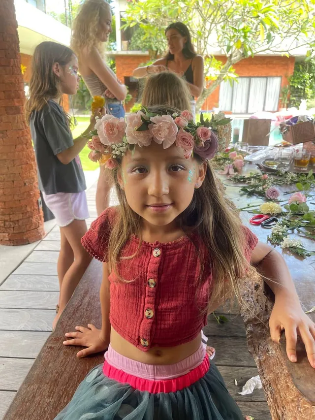 Girl wearing her handmade flower crown at a Bali master class