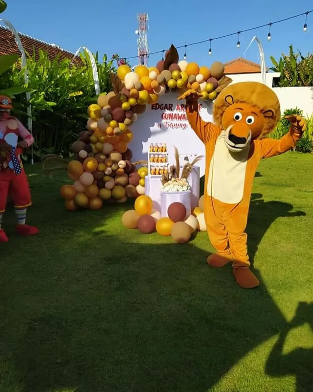 Lion mascot dancing at a safari party in Bali