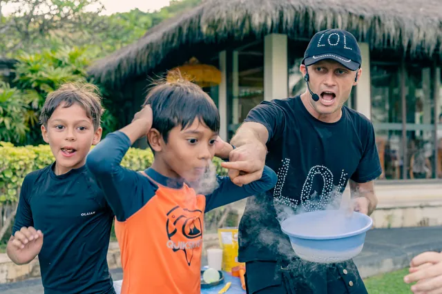 Kids tasting liquid nitrogen ice cream at a Bali party