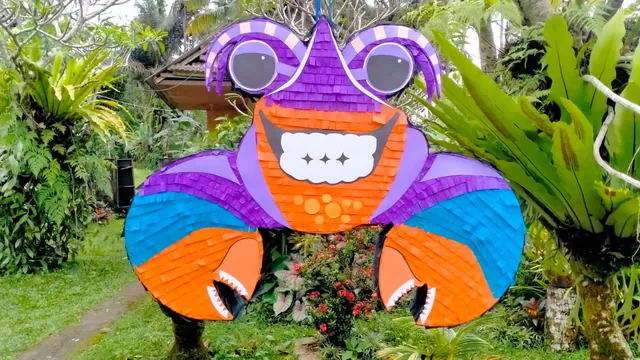 Colourful crab pinata hanging in a Bali garden before the party