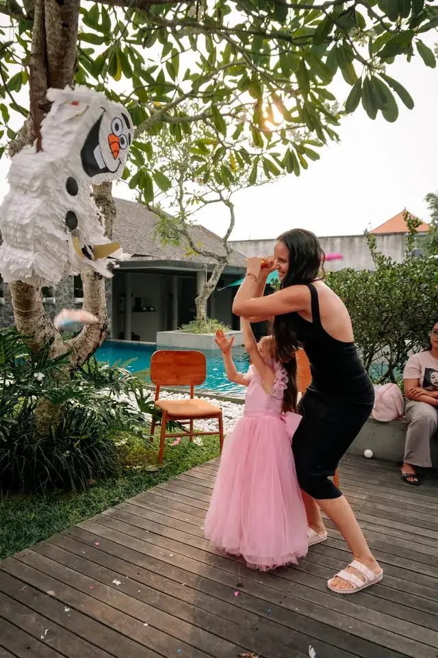 Pinata fun by the pool at a kids party in Bali