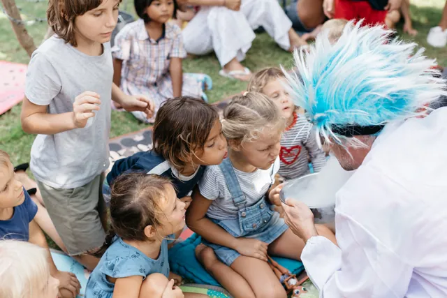 Kids amazed by the science show at a birthday party in Bali