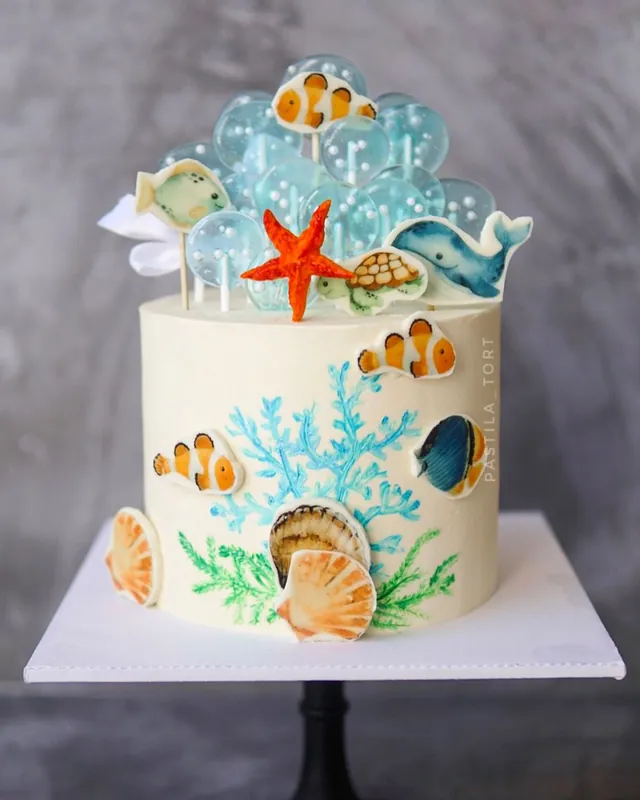 Under-the-sea birthday cake with fish and starfish decorations